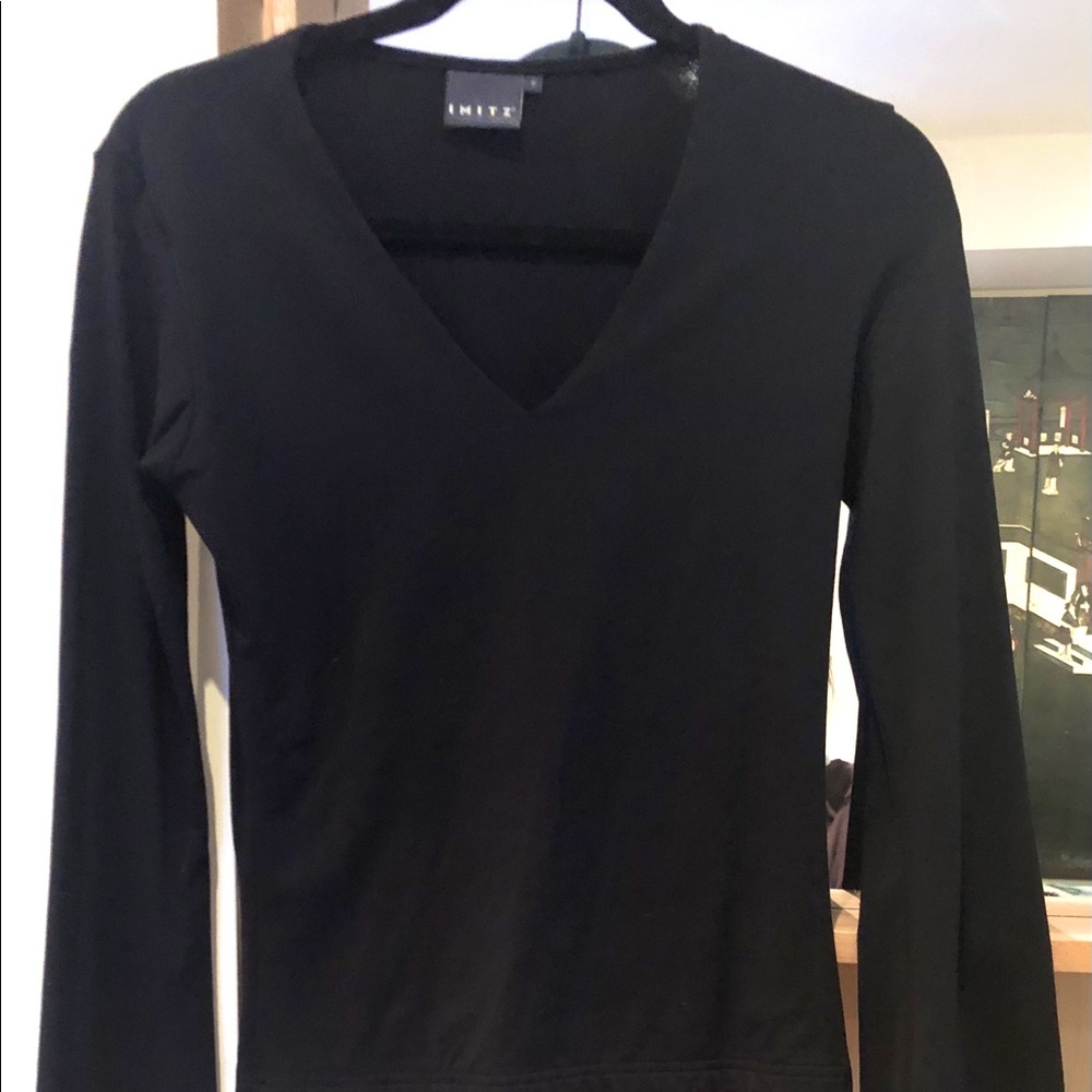 IMITZ V-neck Lycra bell sleeve top.
